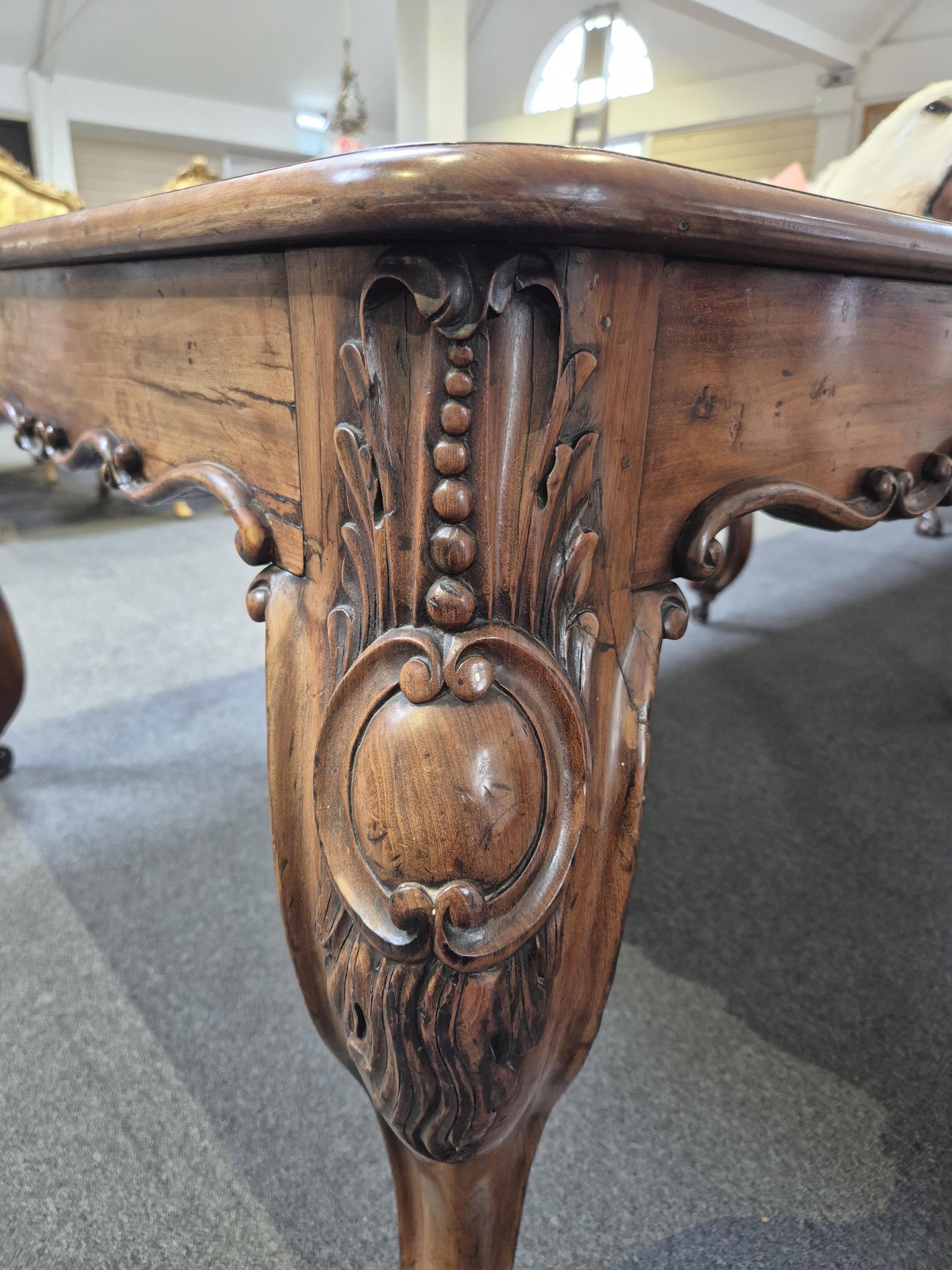 An unusually large William IV mahogany extending dining table